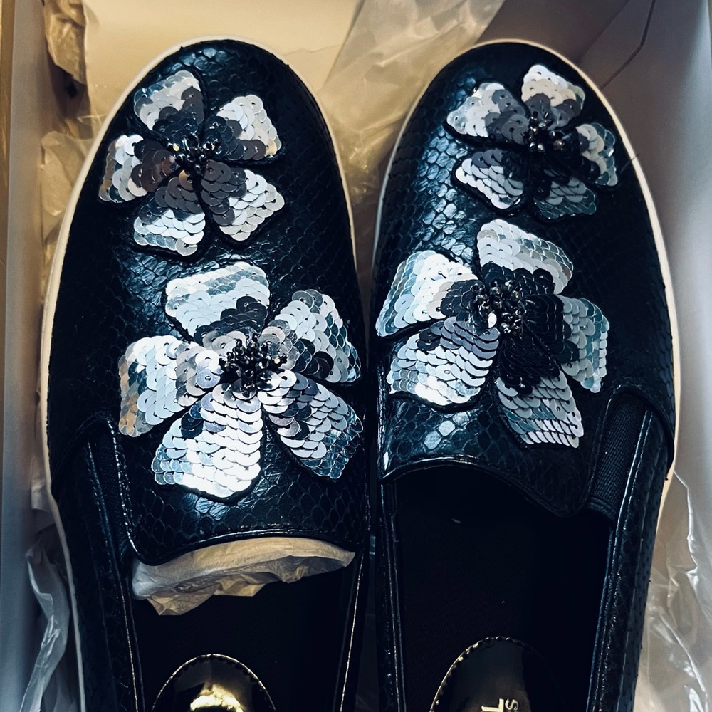 Michael Kors Slip on Embossed Leather 1 inch sole at toe, 1& 1/2 inch at heel.